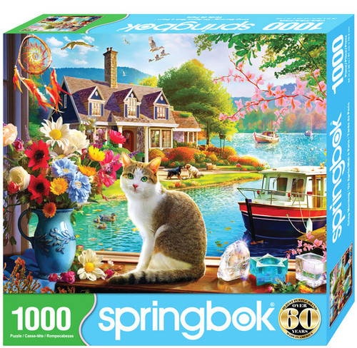 puzzle box teal with image of serenity of a lakeside morning as a charming cat revels in the crispness of spring on the front