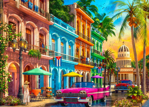 Havana, Cuba, painting the sky in shades of orange, pink, and purple