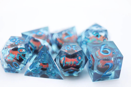 Set of transparent blue dice with eye shaped in their centers