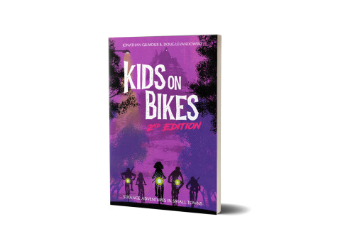 Kids on Bikes Core Rulebook Second Edition cover, depicting five silhouetted figures on bikes riding toward the viewer