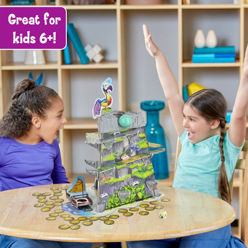 Life style photo of two kids playing a cardboard mountain with plastic top and circle cards and boat at the bottom