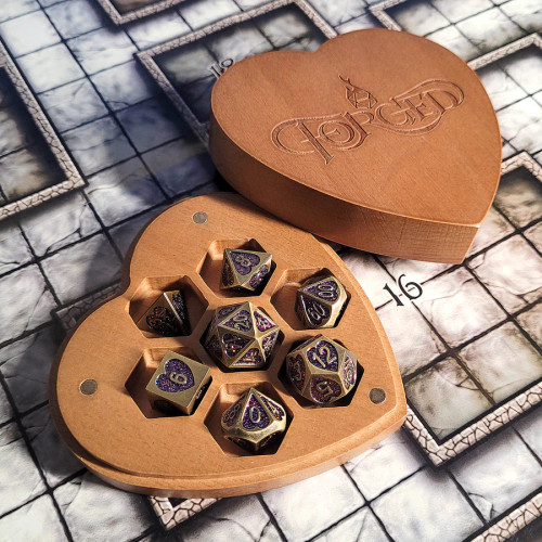 Heartbreaker dice set in brown heart-shaped storage box