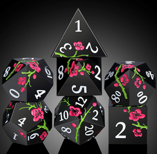 Black metal dice set with cherry blossom patterns