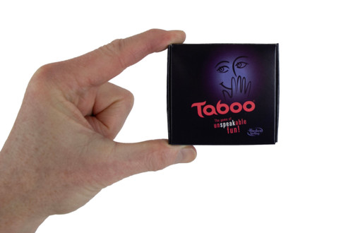 World's Smallest Taboo game box, held between two fingers