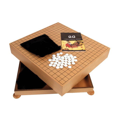 natural wood Go board with chips, displayed on an open angle 