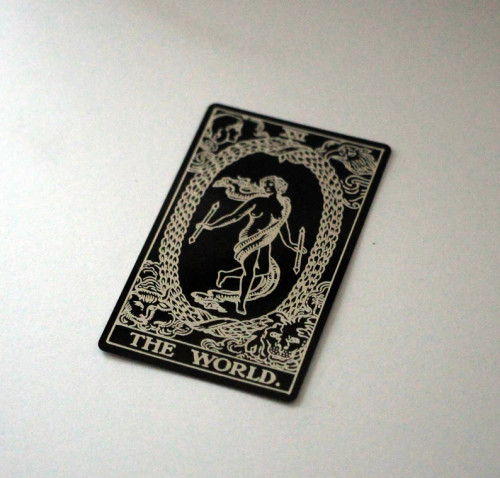 Black etched metal Tarot Card - World