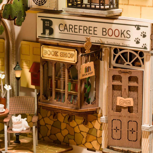 Closeup on model details, a cozy bookshop on a street corner