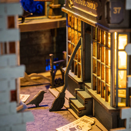 Closeup of the model's magic shop storefront