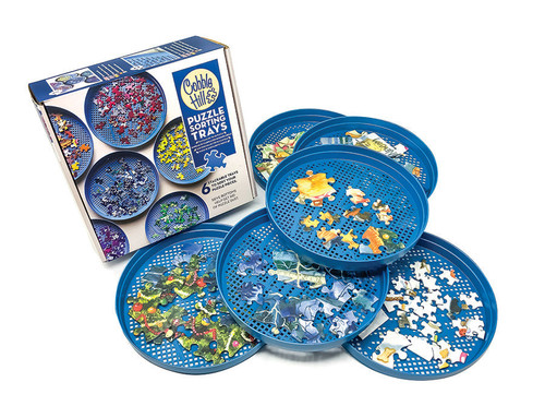 Trays blue with tiny holes and sample pieces in them