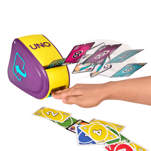 A hand presses the device and cards shoot out