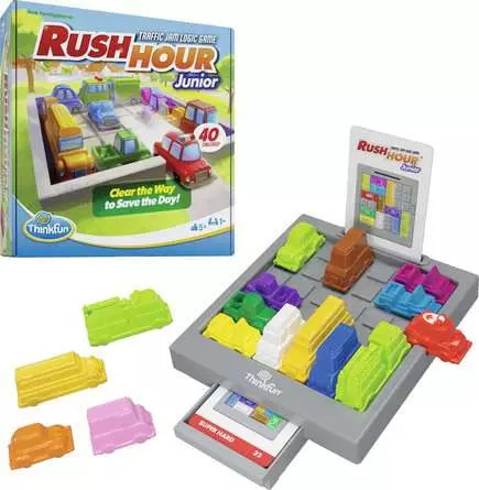 Front of game box with a grey grid holding multi cards with challenge cards