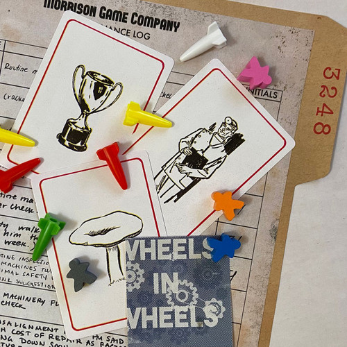 Example game components and tokens, cards depicting a trophy, mushroom and doctor