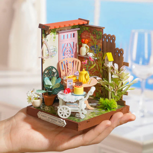 Completed model held in one hand