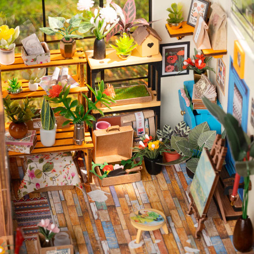 Closeup details of shelves and plants within the greenhouse