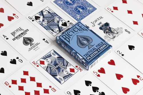 several of the cards in the deck laid out for optimal viewing, blue deck - traditional black and red on white cards with blue back