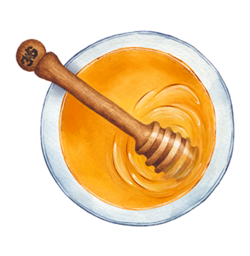 a top view of honey with a  honey stirrer