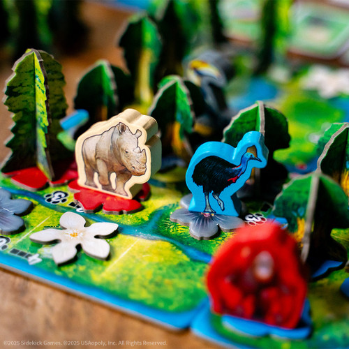The wooden animals on bright flower flowers with 3d cardboard trees