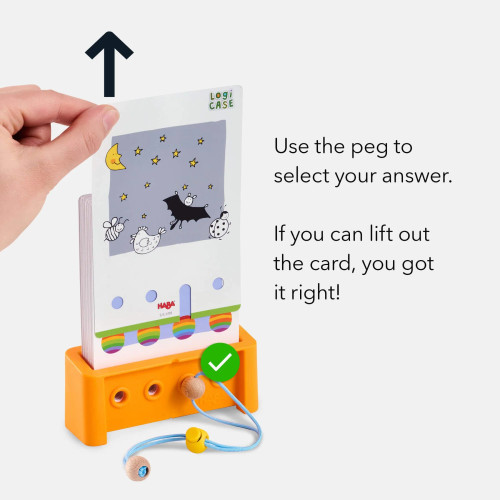 A hand pulls up on the card puzzle to demonstrate how the device works, "If you can lift the card, you got it right!"