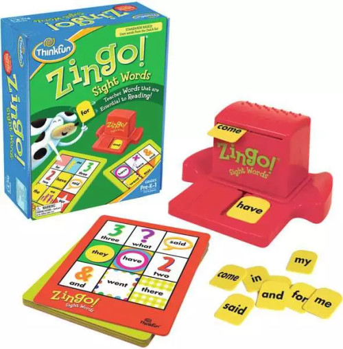 the game components a red zingo plastic holder and zingo word/bingo cards