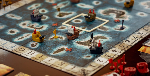 Closeup of ship pieces on the ocean map
