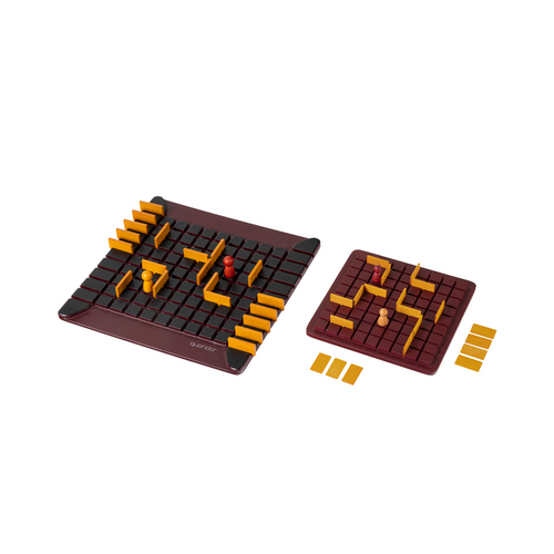 wooden board with grids and wood pieces creating a meeple and maze walls