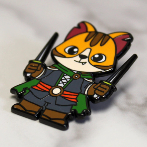 Enamel pin depicting a cute cat in adventuring gear