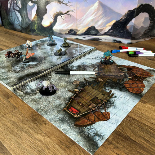 Miniatures and markers mid-encounter on a shipwreck battle mat