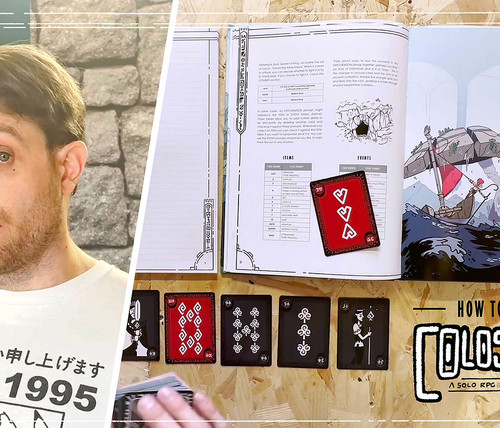 The book open with black and red cards with suits