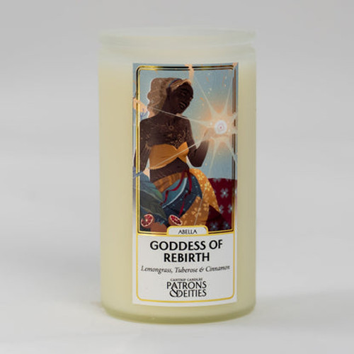 white candle with a character in yellow holding a glowing orb