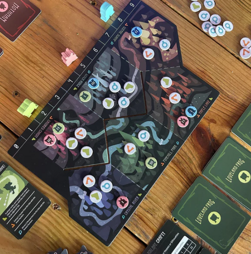 the game board with tokens and game components set out