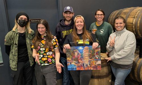 The winning teams pose