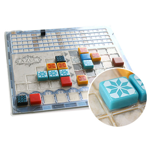 game board with board with different colored tiles