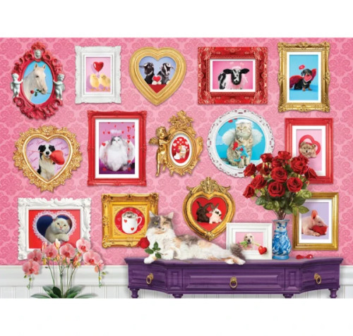 pink wall with animals framed and a cat on a purple table