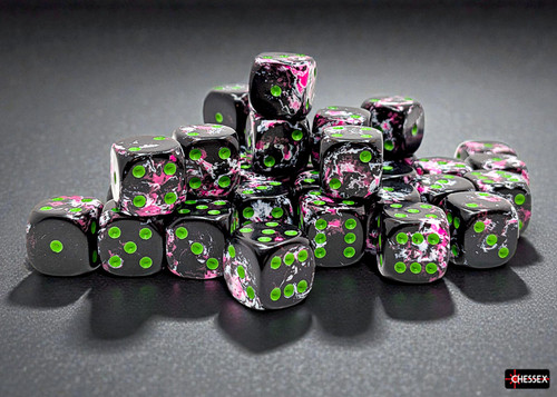 black dice with green dots and pink splatter paint