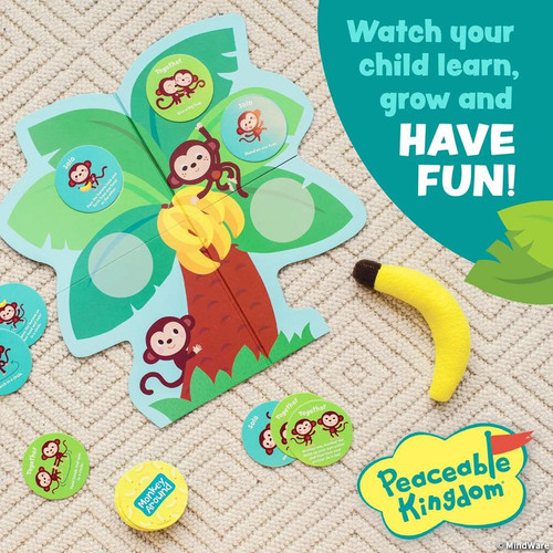 the board of the game board with a banana and circle action cards