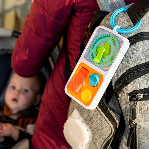 the playtab hooked on a backpack