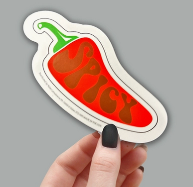 Sticker depicting a red pepper with the word Spicy on it