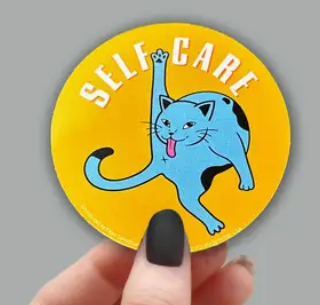 Sticker depicting a blue cat and the text "Self care"