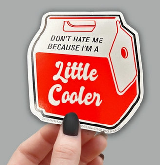 Sticker depicting a cooler that reads, "Don't hate me because I'm a little cooler"