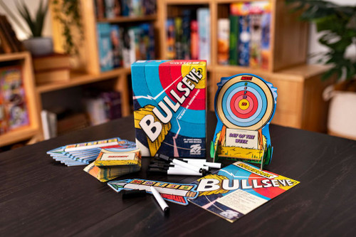 game components on a table,         target, arrows, clue cards, and arrows