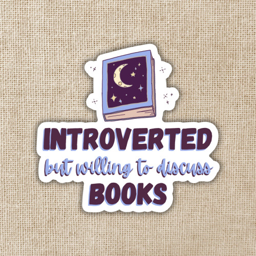Sticker depicting a book and the text "Introverted but willing to discuss books"