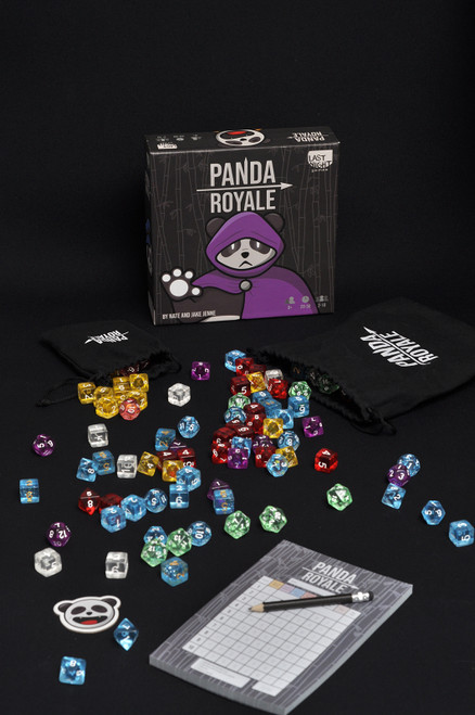 dice spread out before the game box