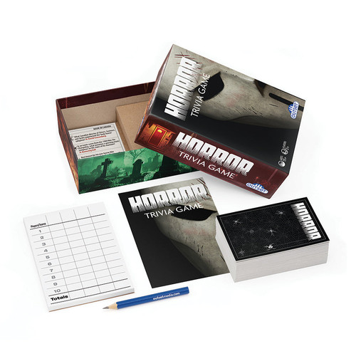 the game box open to reveal contents pencil, cards and score pad