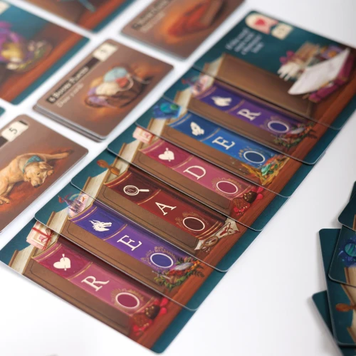 Book cards spell out the word "READER"