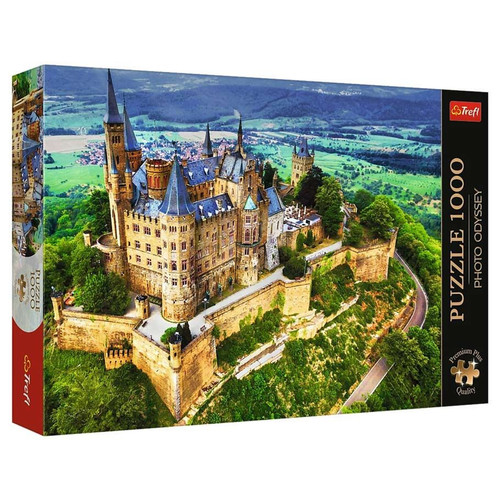 Puzzle box depicting a sprawling castle on a high hill overlooking the countryside below