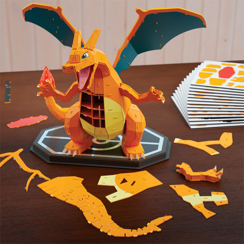a mostly built but several pieces to assemble yet on a charizard