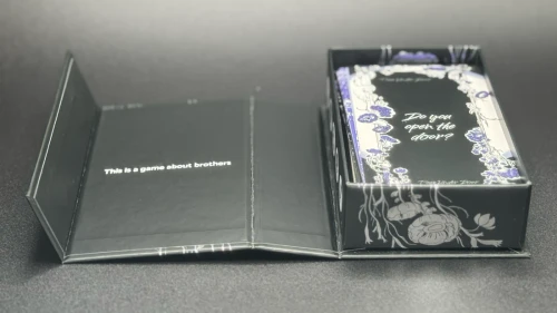 Open game box with a deck of cards inside