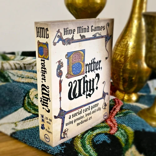 Game box, featuring the title in a calligraphic font