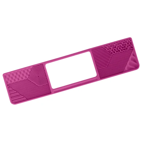 Pink silicone mat with an open space for a laptop touchpad