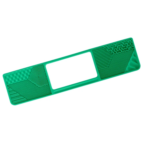 Green silicone mat with an open space for a laptop touchpad